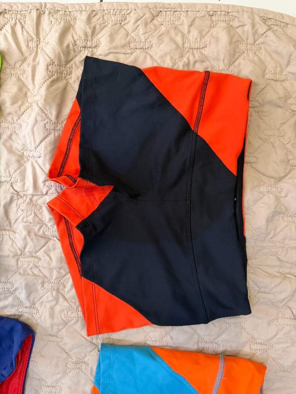 Medium red and black rabbit racing spandex shorts